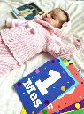 beb_con_libro_y_juego_la_noche_que_tu_naciste_800x.webp
